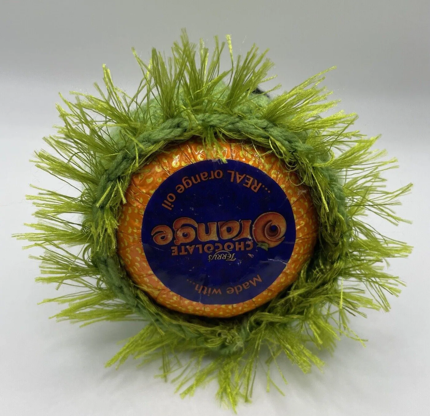 The grinch chocolate orange cover underneath