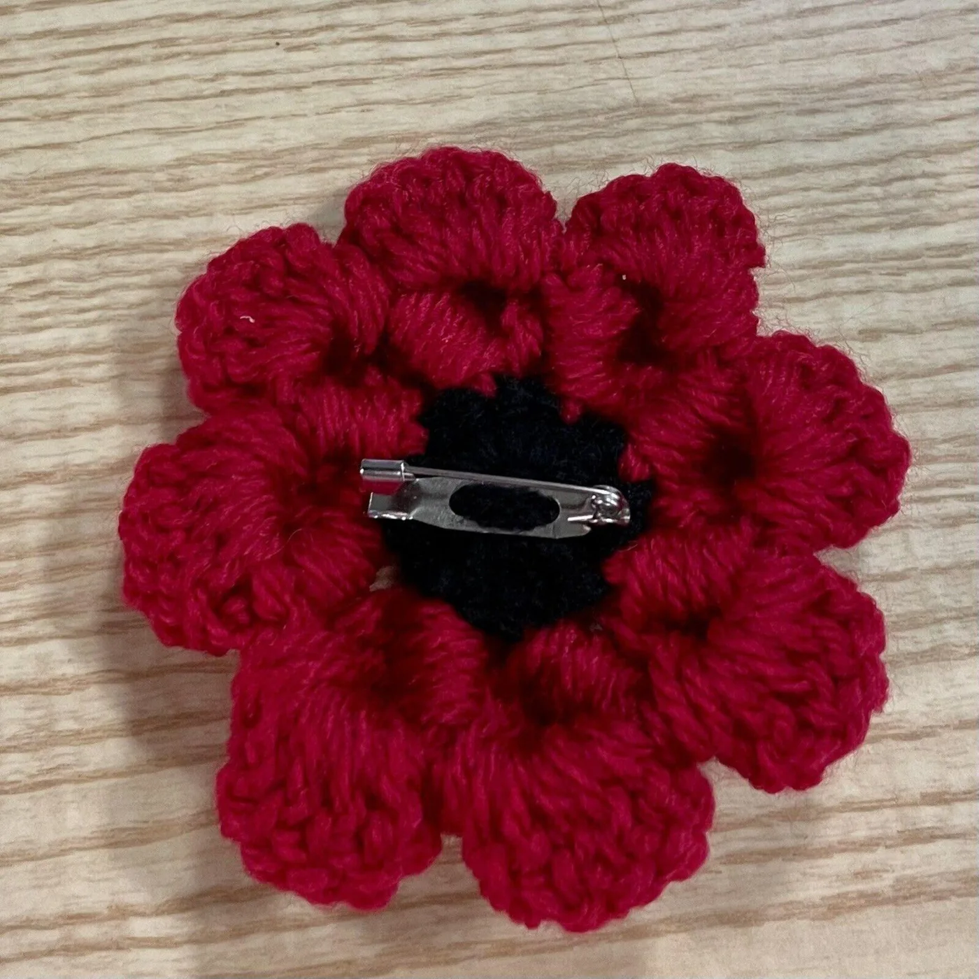 Knitted crocheted 3d poppy back